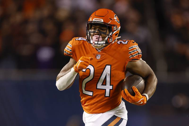 Chicago Bears running back Khalil Herbert runs with the ball against the Washington Commanders, Thursday, Oct. 13, 2022, in Chicago.