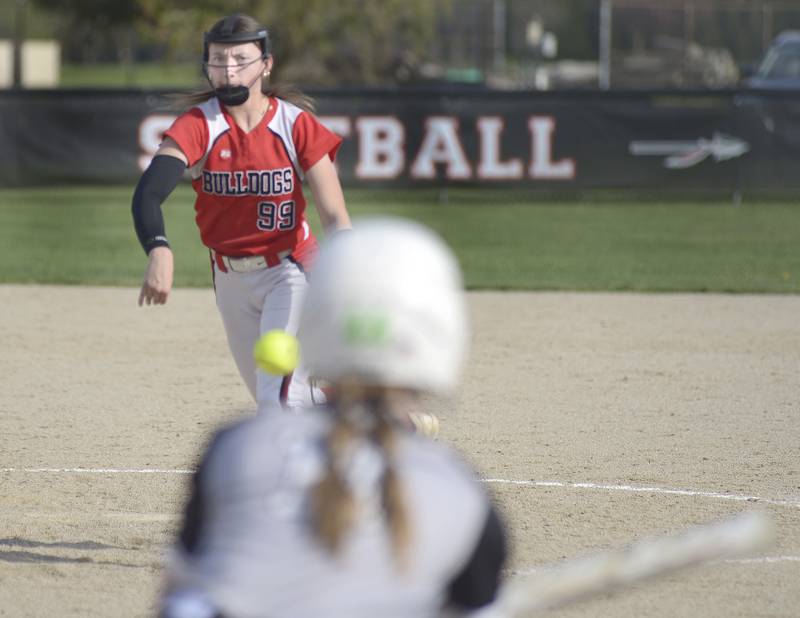 Streator starting pitcher Makenna Ondrey lets go with a pitch against Woodland Thursday at Woodland.