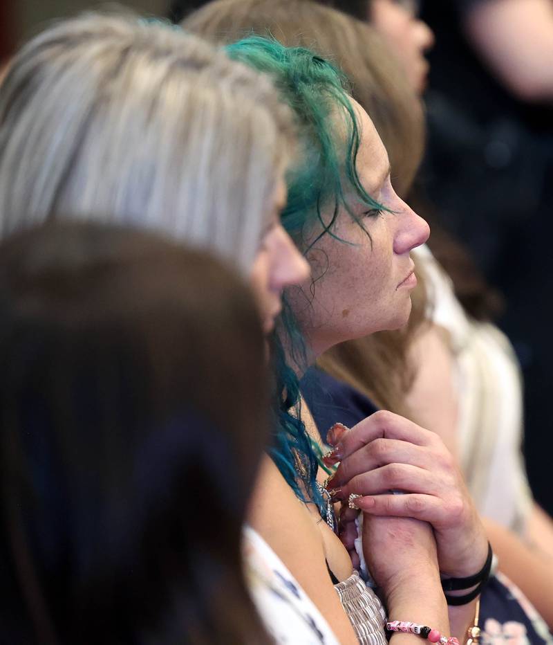 Ericka Sasso, mother of Gracie Sasso-Cleveland who was murdered by Timothy Doll in 2023, listens as Circuit Court Judge Philip Montgomery pronounces his sentence Thursday, Aug. 14, 2025, at the DeKalb County Courthouse in Sycamore. Doll was sentenced to 52 years in prison.