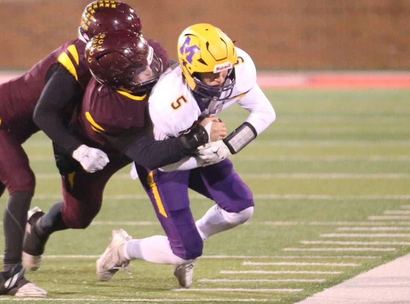 Montini's Nick Iron brings down Monticello quarterback Jax Bailey during the Class 3A State football championship on Friday, Nov. 29, 2024 at Hancock Stadium in Normal.