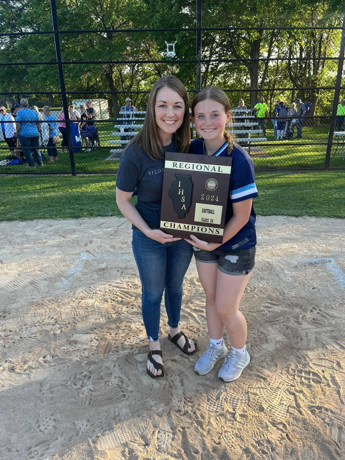 Heidi (Jamison) Franklin (left) played on BV's first regional championship in 2006. Her niece,  Abby Jamison (right) is a sophomore varsity member of this year's regional champions.