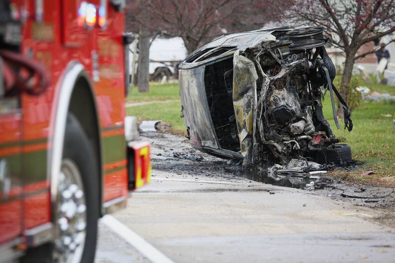 Two drivers were taken to the hospital with serious injuries after a crash led to one car being overturned and on fire on Sunday, Oct. 30, 2022, in Harvard.