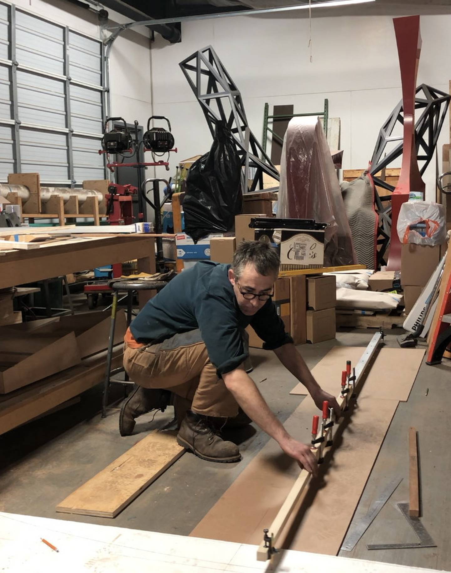 Artist Joshua Enck works on Hortus in his New York studio. When completed, the 14-foot steel sculpture will be  installed at the Geneva Public Library as public art in the Memorial Garden. The Dudley D. and Delores R. Malone Family Foundation provided the funding for the garden and the art.