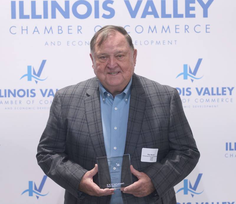 Ron Borellii poses with his Cornerstone award during the Illinois Valley Chamber of Champions of Change Awards Night on Wednesday, May 6, 2026 at the Westclox Event Center in Peru.