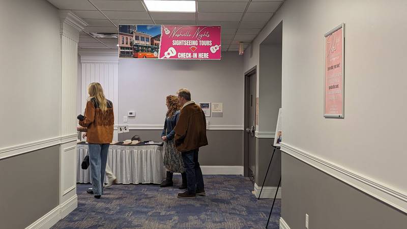 A Nashville-themed display greets attendees at the entrance of the Shorewood HUGS annual chocolate ball fundraiser on Saturday, Feb. 3, 2024, at the  Posh Banquets & Event Center in Joliet. The fundraiser's theme this year was "Nashville Nights."