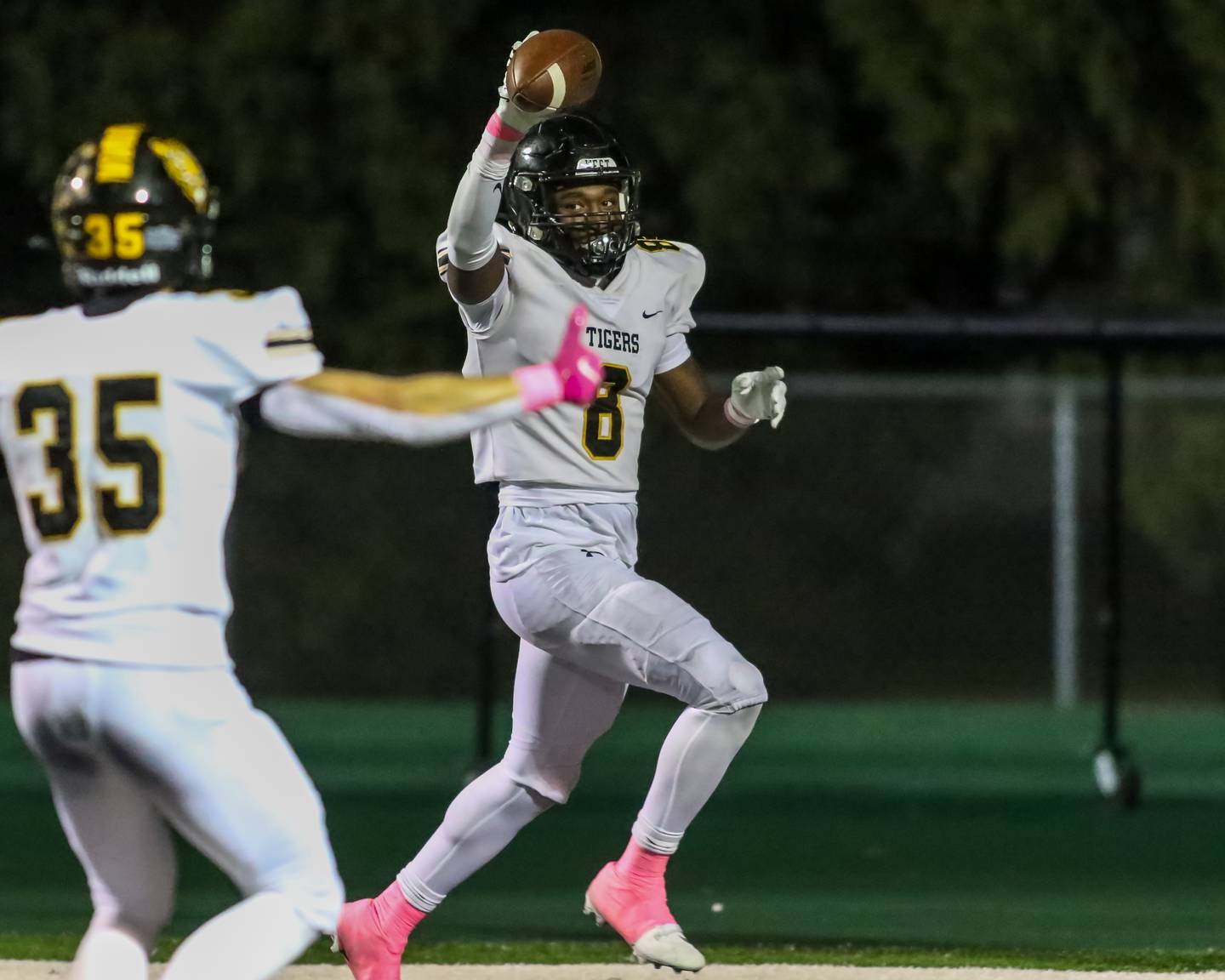 Joliet West's Micah Mcnair (8) celebrates a pick six during football game between Joliet West at Plainfield Central.   Oct 20, 2023.
