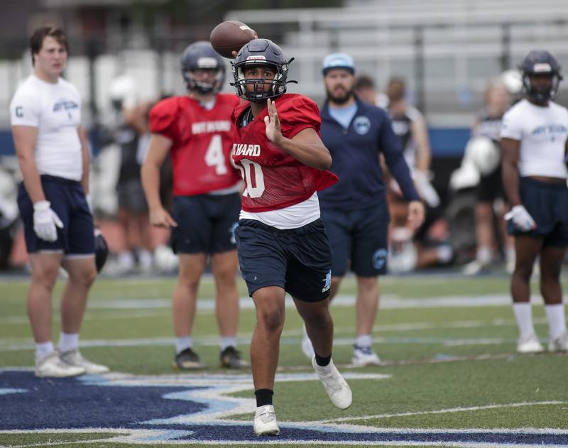 Downers Grove South’s Ryan Dawson passes the ball during the Downers Grove South 7-on-7 in Downers Grove on Saturday, July 16, 2022.