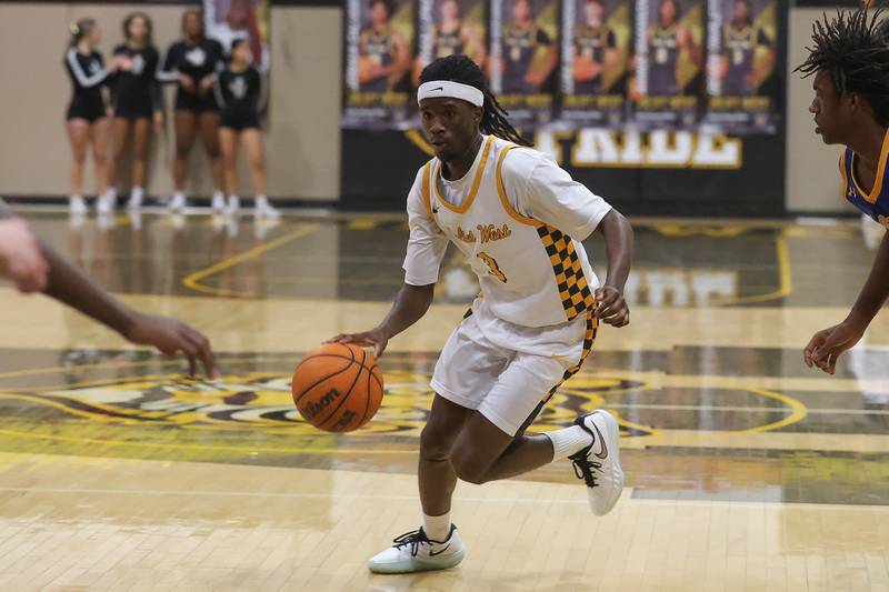 Joliet West’s Deven Triplett looks to make a play against Joliet Central on Tuesday, Feb. 17, 2026 in Joliet.