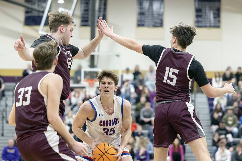 Eastland’s Parker Krogman works against the Dakota defense Wednesday, March 5, 2025, during the Class 1A boys basketball Sectional semifinal at Pecatonica High School.