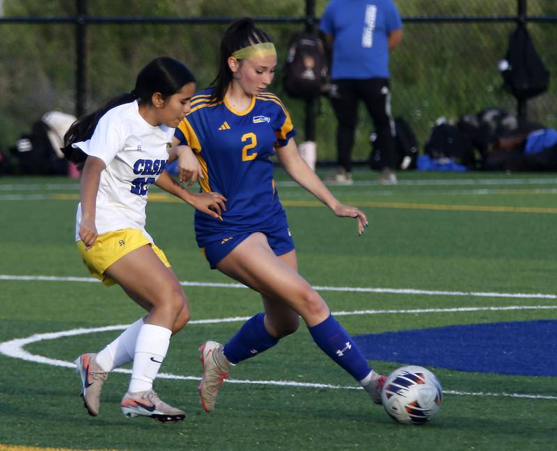 Willows Academy's Mary Seuffert takes a shot at goal in front of Richmond-Burton's Sydney Frericks during an IHSA Class 1A Cristo Rey St. Martin Sectional semifinal girls soccer match on Tuesday, May 26, 2026 at Cristo Rey St. Martin College Prep, in Waukegan.