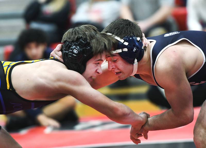 Johnsburg's Chase Davis and Lisle's Alexander Ferari start their 132-pound match at the Stillman Valley Holiday Tournament on Saturday, Dec. 20, 2025 at Stillman Valley High School.