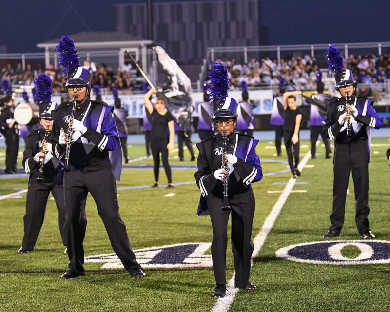 Downers Grove North marching band performs during the Downers Grove South Marching Mustangs Music Bowl on Saturday Oct. 5, 2024, held at Downers Grove South.