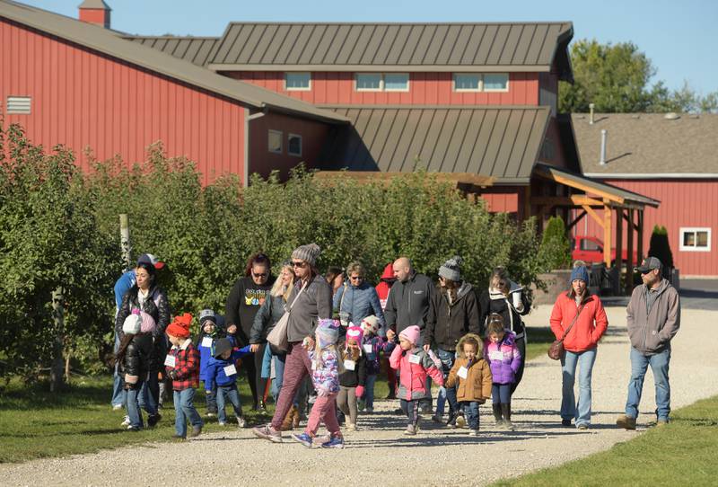 A school groups visits the Jonamac Orchard in Malta on Wednesday, Sept. 28, 2022.