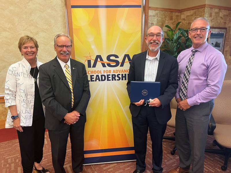 Dr. McBride graduated today from the IASA School for Advanced Leadership, an 18-month program designed to elevate superintendent’s leadership skills and impact student achievement. Pictured (L to R): Dr. Nancy Blair, ISAL Facilitator; Dr. Gary Zabilka, ISAL Facilitator; Dr. Robert McBride, Superintendent of Lockport Township High School District 205; Dr. Patrick Halloran, ISAL Coach.