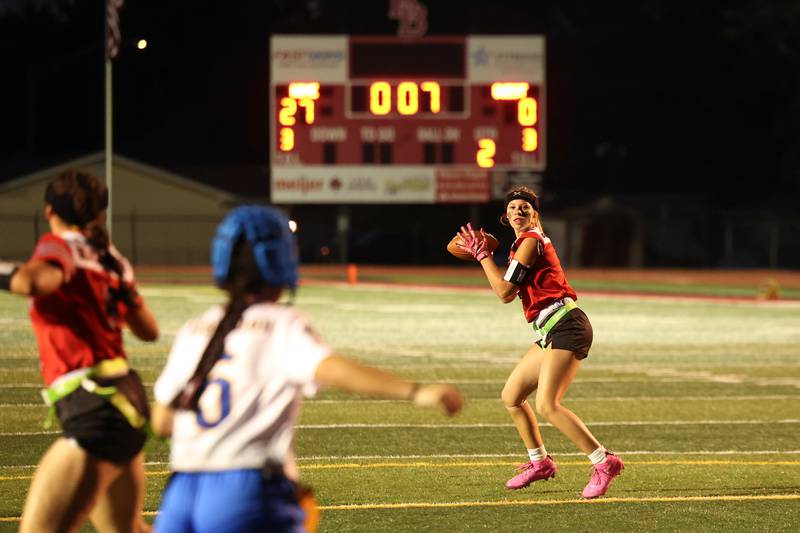 Bradley-Bourbonnais' Elise Munsterman looks to throw a pass during the Boilermakers' 60-7 victory over Joliet Central in the season opener on Aug. 25, 2025.