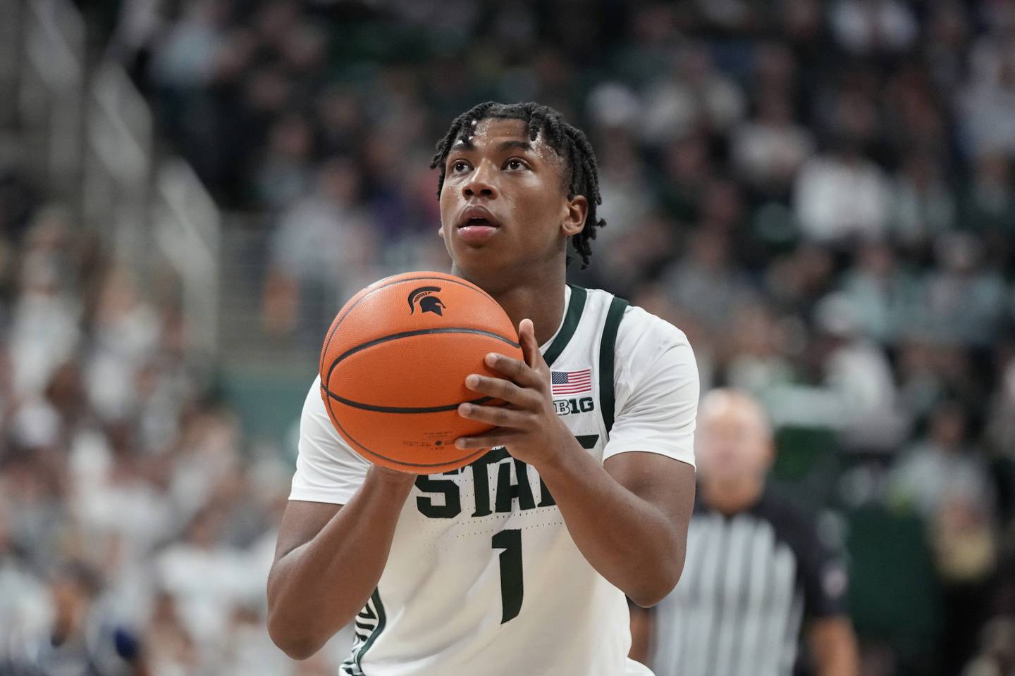Michigan State guard Jeremy Fears Jr. plays, Nov. 28, 2023, in East Lansing, Mich. Fears is recovering after he was shot in the leg while on holiday break near his hometown and underwent surgery Saturday morning, Dec. 23, according to the university.
