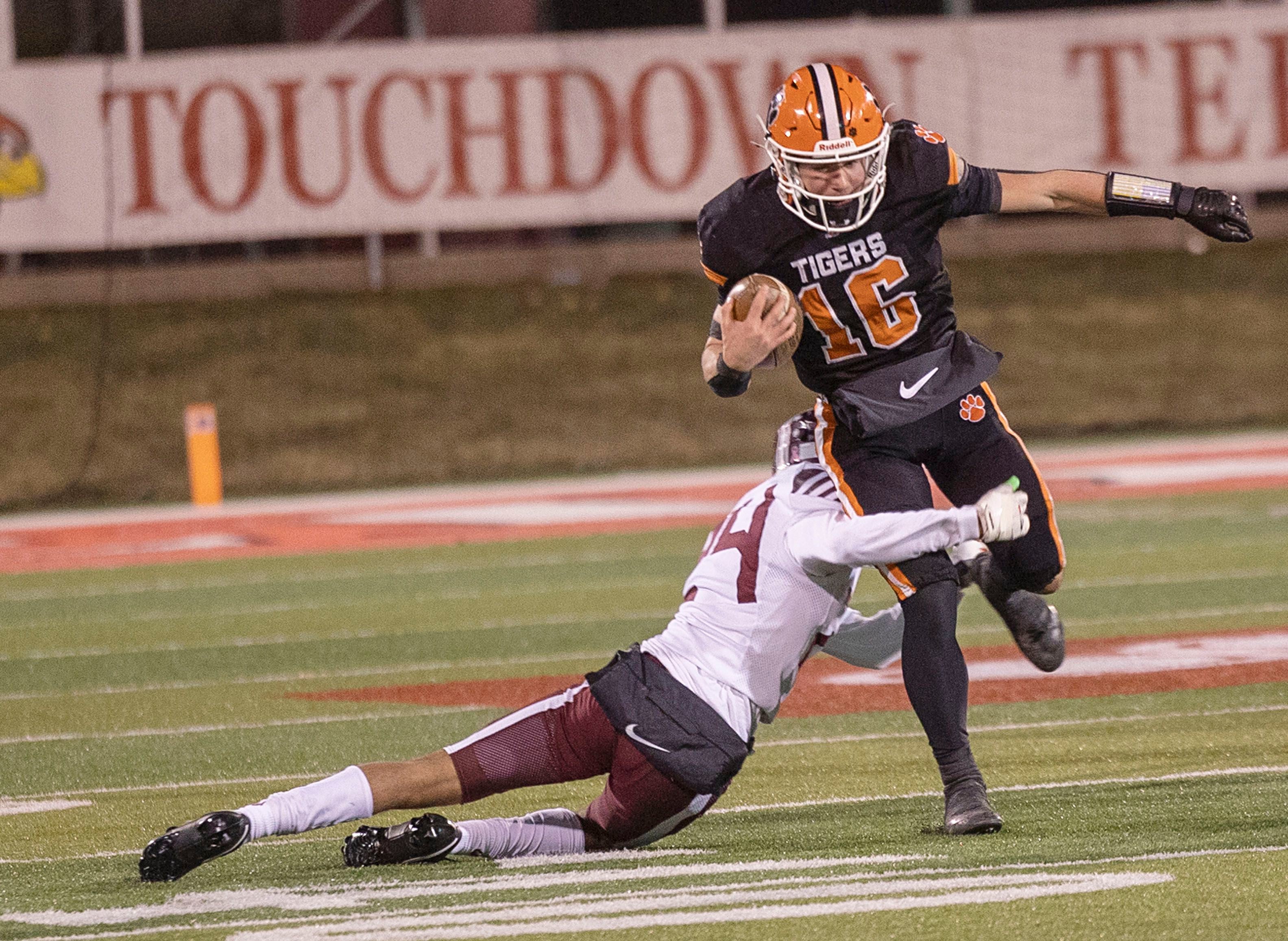 Byron’s Andrew Talbert picks up yards against Tolono-Unity Friday, Nov. 28, 2025, in the Class 3A football finals at Hancock Stadium at ISU.