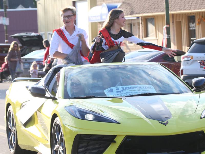 Hall queen and king candidates Logan Corsolini and Kassi Roof ride in the Hall High School Homecoming parade on Thursday, Sept. 28, 2023 in Spring Valley.