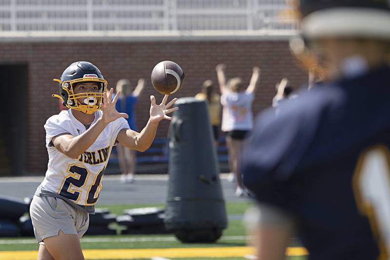 Sterling’s Emmanuel Arreola hauls in a pass Tuesday, Aug. 13, 2024 during football practice.
