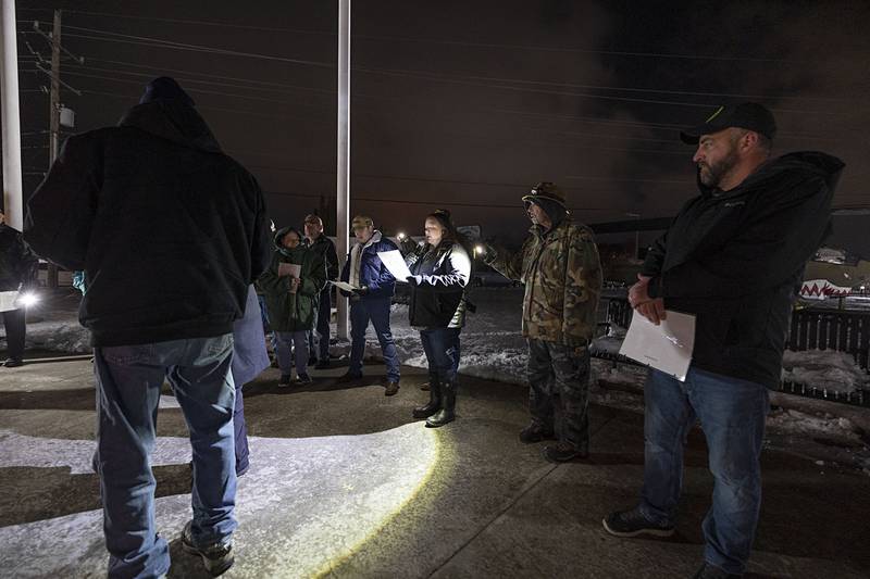 Veterans Memorial Park commissioner Lexi Willey reads off a list of names of Illinois soldiers who are still POW/MIA on Saturday, Dec. 6, 2025.