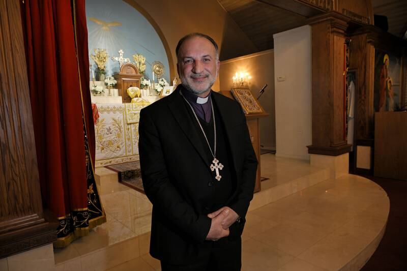 Fr. Samer Youhanoun poses in his St. John the Baptist Syriac Orthodox Church in Villa Park on Monday, Dec. 9, 2024.
