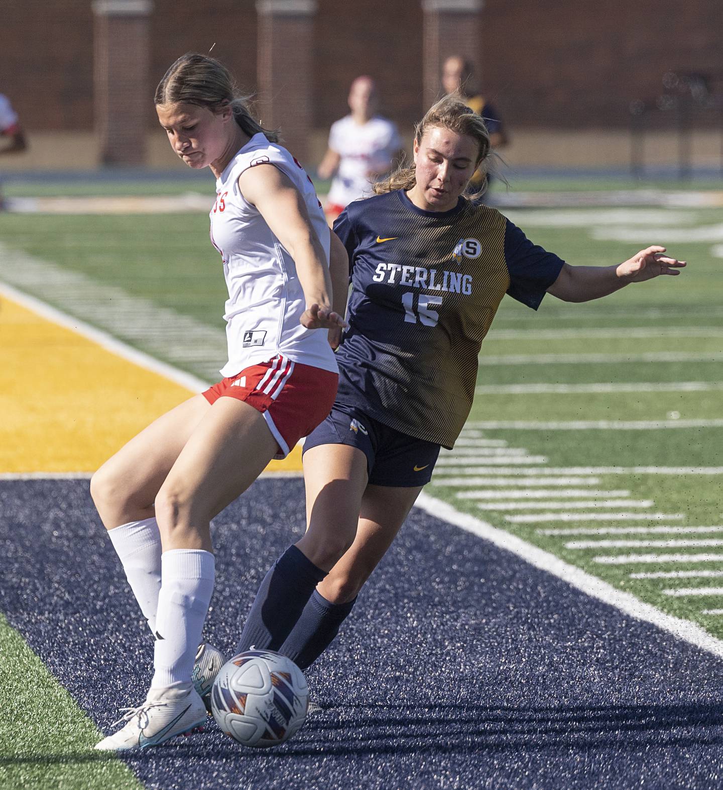 Sterling’s Natalie Scarbrough works against Streator’s Rhea Huey Friday, May 15, 2026, during the Class 2A regional soccer quarterfinal.