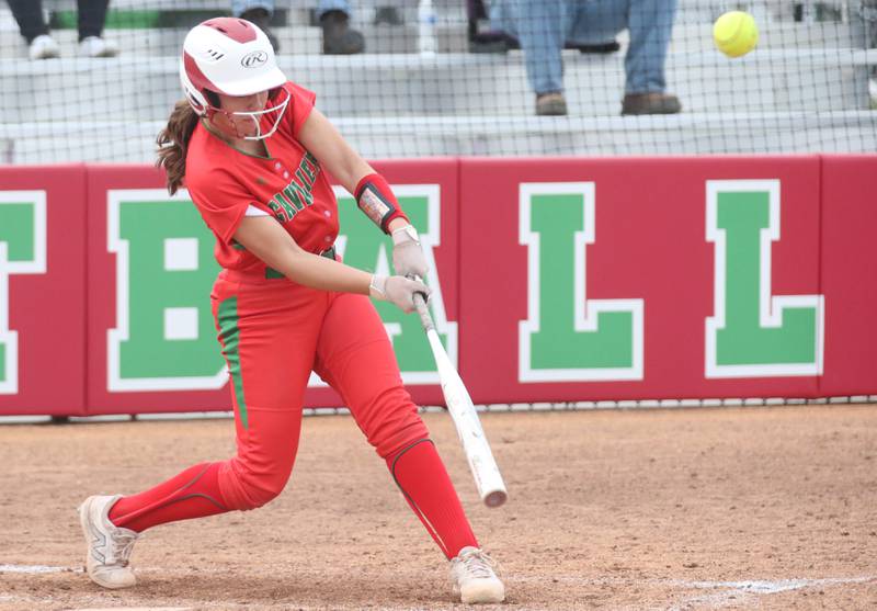 L-P's Callie Mertes makes contact with the ball against Rochelle on Wednesday, April 10, 2024 at the L-P Athletic Complex in La Salle.