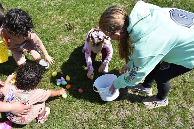 Kids gather up eggs Saturday, April 12th, 2025, during the Coloma Park District egg hunt at Centennial Park in Rock Falls.
