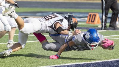 Photos: Newman beats up on Kewanee in Week 8 football