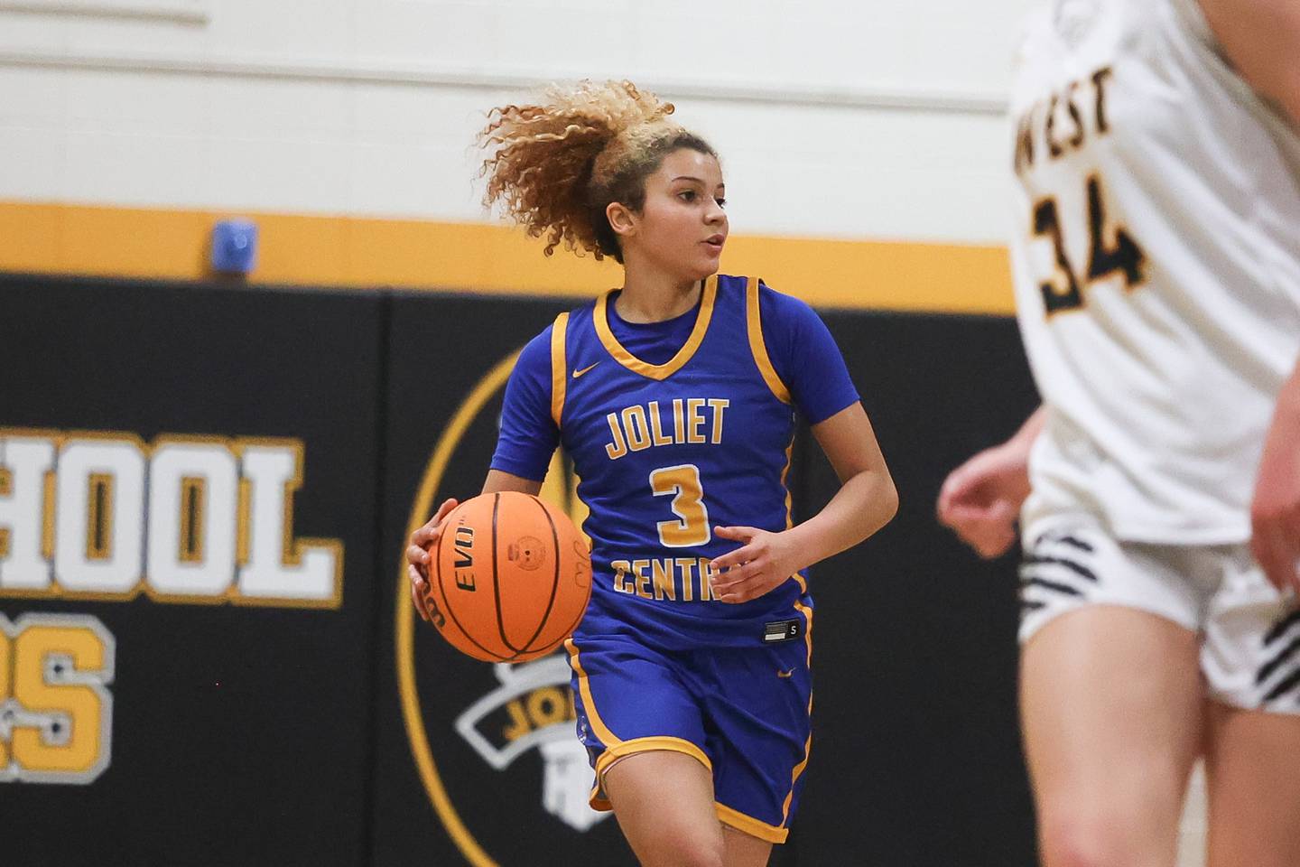 Joliet Central’s Nevaeh Wright looks for a play against Joliet West on Thursday, Jan 30, 2025 in Joliet.