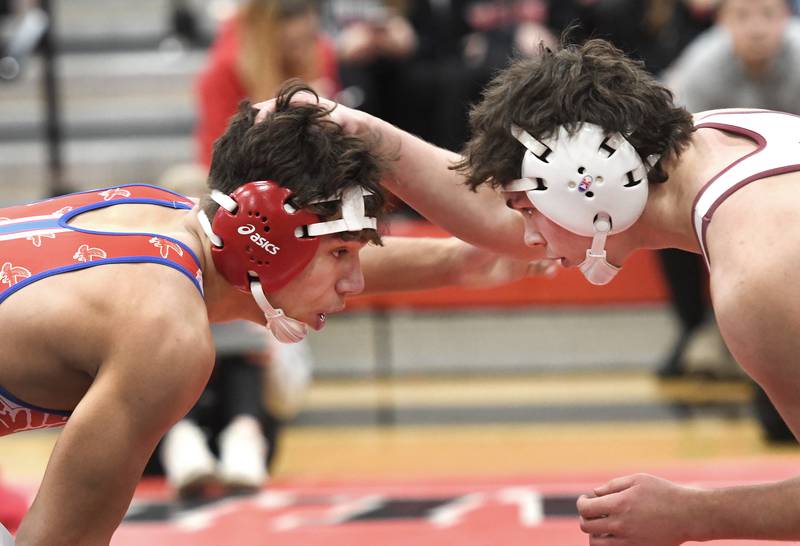 Oregon's Jayden Berry (left) and Wheaton Academy's Lincoln Hoger start their 150-pound match at the Stillman Valley Holiday Tournament on Saturday, Dec. 20, 2025 at Stillman Valley High School.