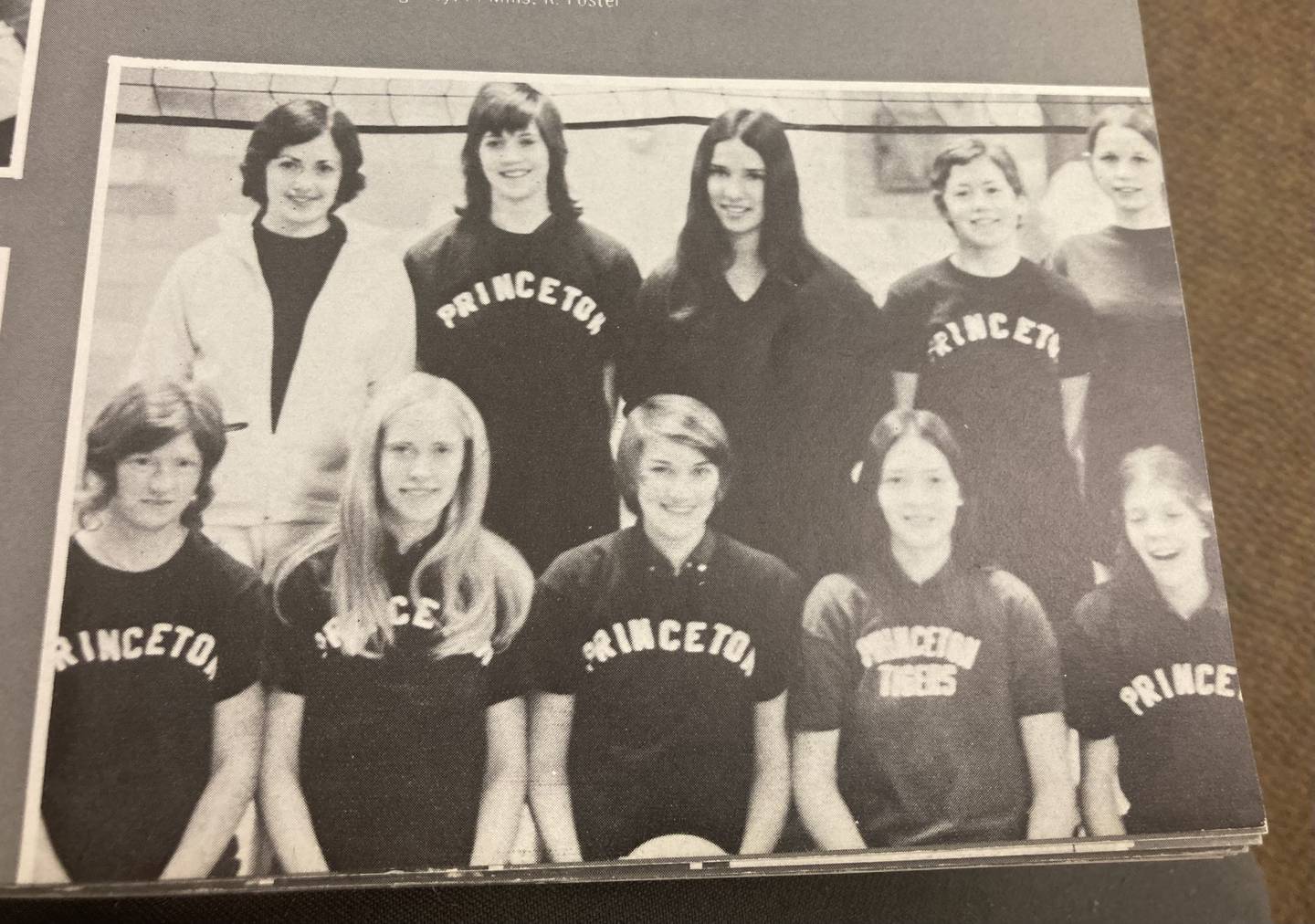 Princeton High School fielded its first volleyball team (shown here in the PHS yearbook) in 1973 following the passing of IX in 1972. Julie Neagle coached the first year, giving way to Rita Placek, who had a highly successful 25-year run, including the 1990 state championship.