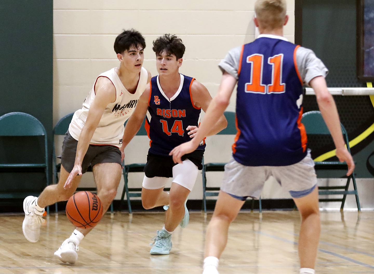 McHenry's Marko Visnjevac brings the ball up the court during a game against Buffalo Grove Friday, June 23, 2023, in the Crystal Lake South Gary Collins Shootout, at the high school in Crystal Lake.
