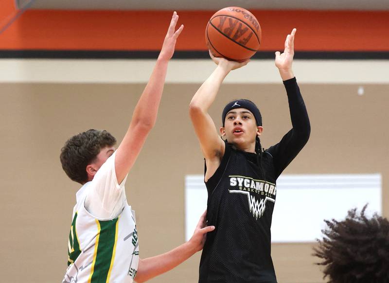 Sycamore’s Unique Shaw shoots a floater during their summer game against Boylan Tuesday, June 18, 2024, at DeKalb High School.