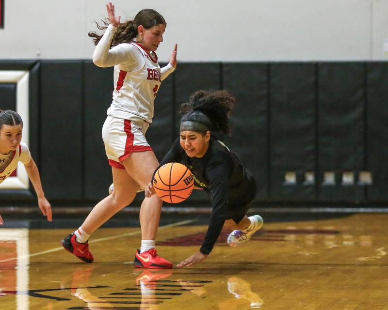 Waubonsie Valley's Arianna Garcia (1) is fouled during their Class 4A Bolingbrook Sectional final basketball game between Waubonsie Valley at Benet. Feb 27, 2025 in Bolingbrook.