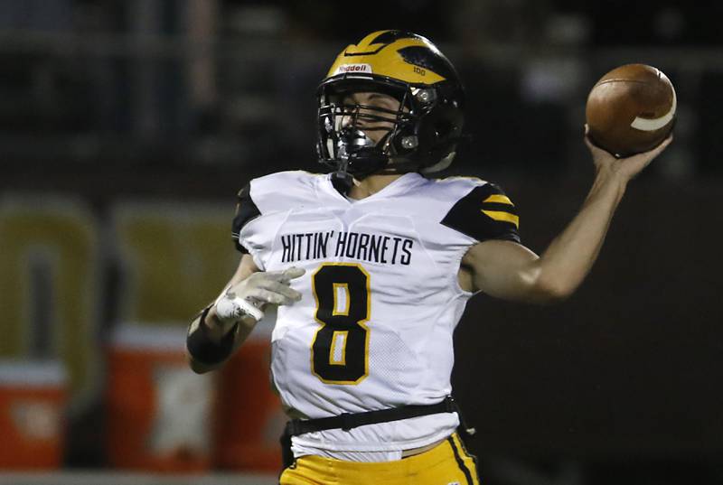 Richmond-Burton's Jack Martens throws a pass during a Kishwaukee River Conference football game against Richmond-Burton on Thursday, Oct.12, 2023, at Richmond-Burton High School.