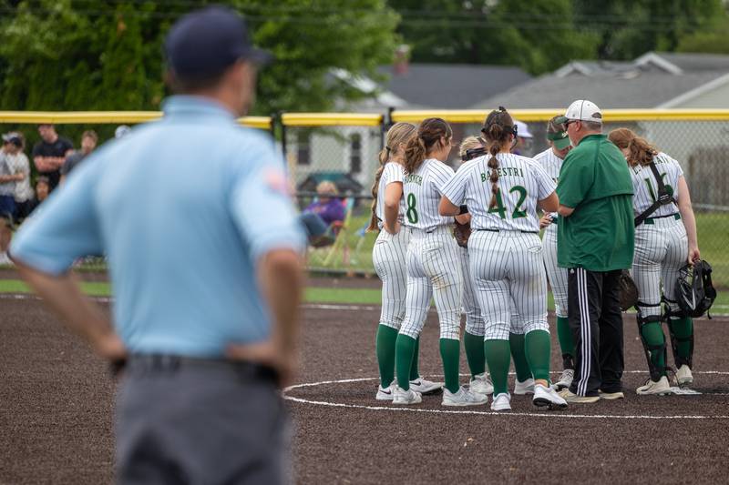St. Bede players and coach meet on mound during game on Tuesday, May 27, 2025 at Illinois Valley Central High School in Chillicothe.