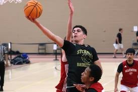Photos: Sycamore boys basketball battles Marmion in DeKalb Live tournament