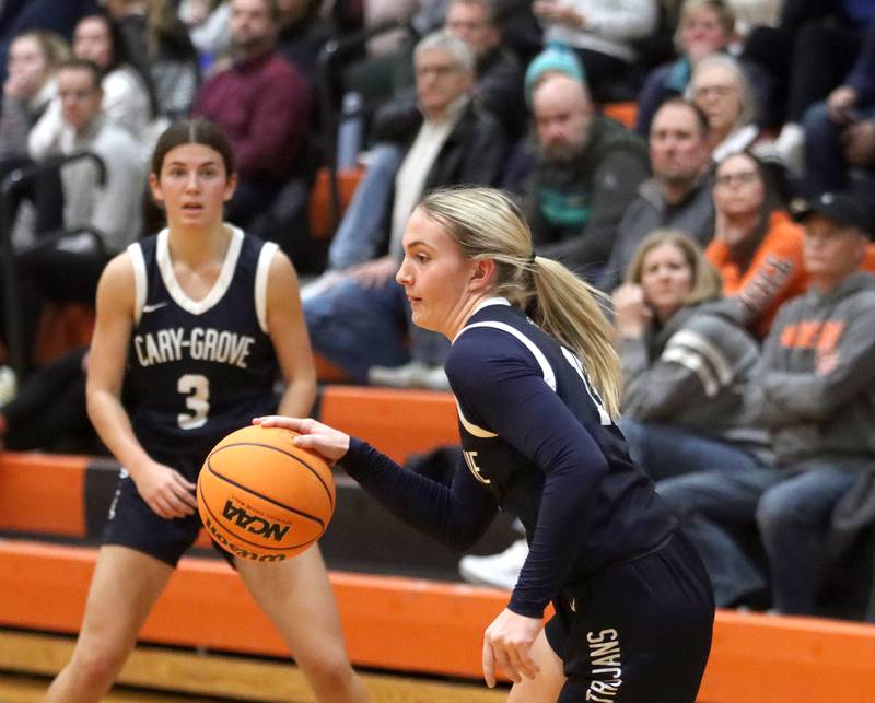 Cary-Grove’s Malaina Kurth moves the ball against Crystal Lake Central in varsity girls basketball on Tuesday, Jan. 7, 2025, at Crystal Lake Central High School in Crystal Lake.