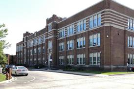 Woodstock High School graduate composes song to be performed by students Thursday