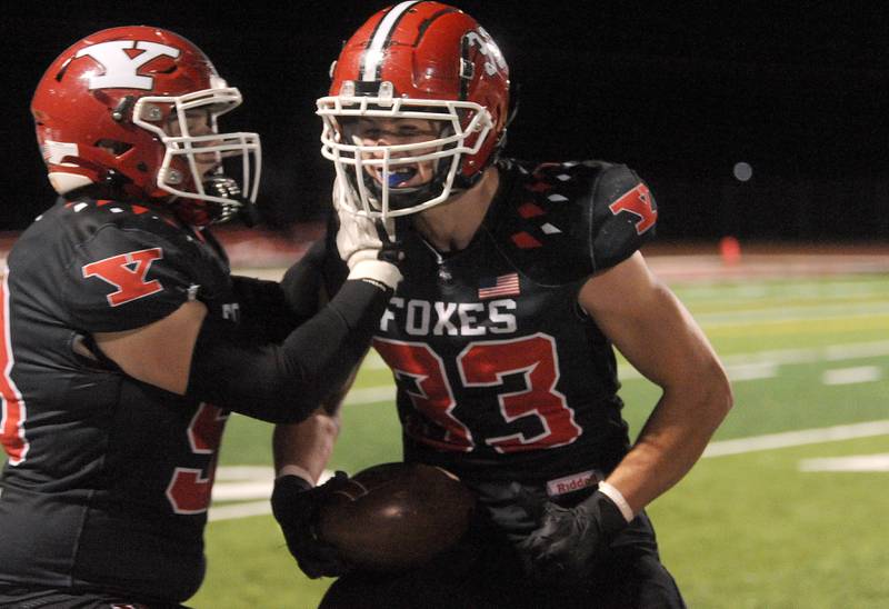 Yorkville's Jacob Homerding (33) celebrates the recovery of a pooch kickoff giving the Foxes great field position against Plainfield North during a varsity football game at Yorkville High School on Friday, Oct. 20, 2023.