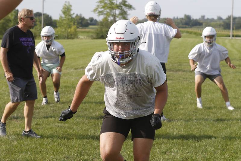 Hampshire’s Gage Homola takes part in a tackling drill during the first day of football practice Monday, August 7, 2023, at Hampshire High School.