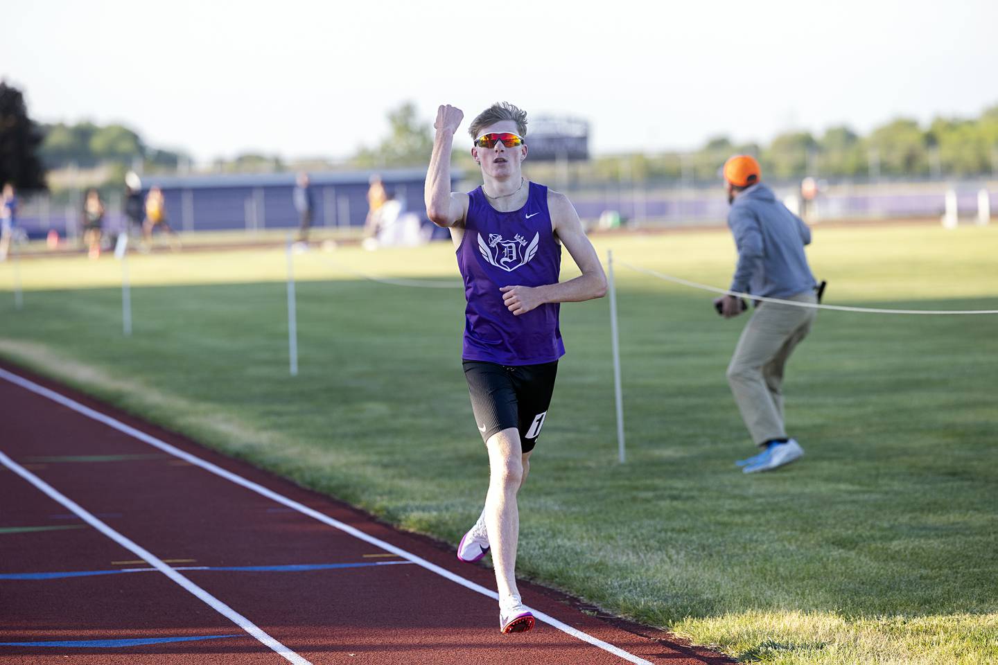Dixon’s Averick Wiseman celebrates a run away win in the 1600 Wednesday, May 20, 2026, at the Rochelle Class 2A boys track sectionals.