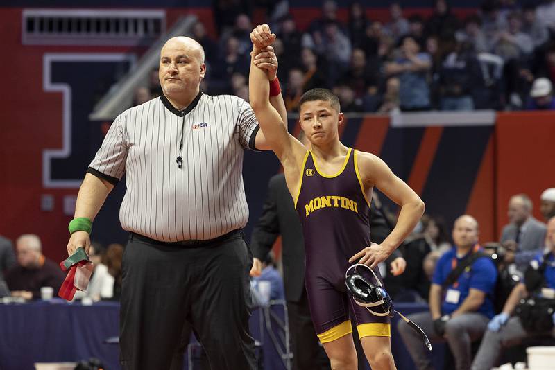 Montini’s Allen Woo beats St. Patrick’s Daniel Goodwin in the 113 pound weight class of the 2A state individual wrestling finals Saturday, Feb. 22, 2025, at State Farm Center in Champaign.