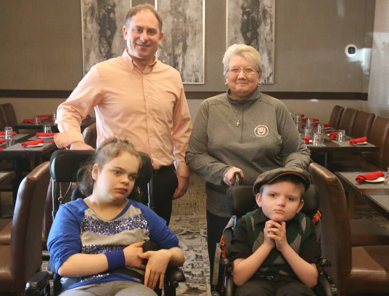 Lighted Way is preparing for their upcoming Spaghetti dinner. Jim Lannen co-owner of Uptown Bar and Grill and Hellen Maurice of Lighted Way poses with Lighted Way students Taylor and Wyatt on Monday, March 20, 2023 at Uptown Bar and Grill in La Salle. The event will take place on Monday, March 27, 2023 at Uptown from 4-7p.m. 
The dinner will offer dine in, carry out and drive thru service. Your dinner will include a large portion of spaghetti with meat sauce, salad, bread and cake all for a $12 donation!
There will be plenty of raffle baskets to buy chances on as well as a 50/50. The fundraiser benefits the quality of life for individuals with disabilities in the Illinois Valley.