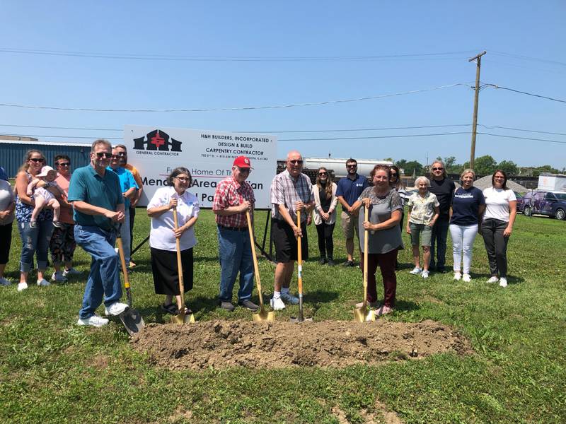 (From left) Mendota Area Christian Food Pantry Assistant Director Dani Carr, Founder Sister Adele Human, Volunteer Daniel Spies, Board Member Paul Songeroth and Executive director Tracy Cooper participate in the groundbreaking Tuesday, July 11, 2023, for the Mendota Area Christian Food Pantry.
