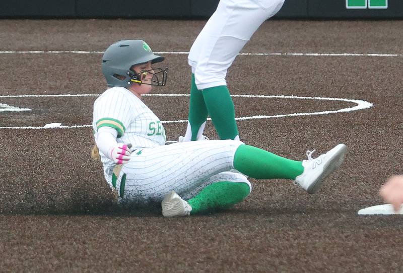 Seneca's Emma Mino slides safely into second base against Geneseo on Thursday, March 12, 2026 at Seneca High School.