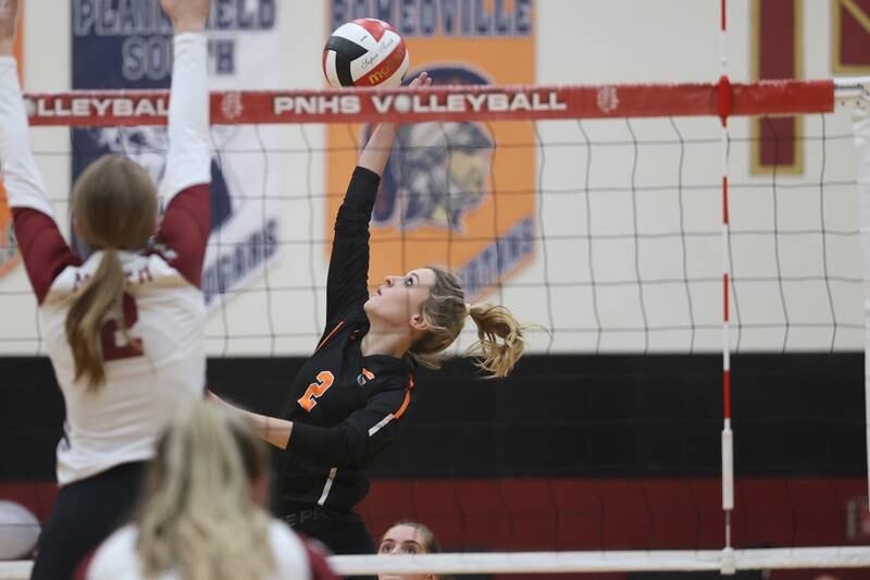 Plainfield East’s Sophia Williams hits a shot against Plainfield North on Thursday night.