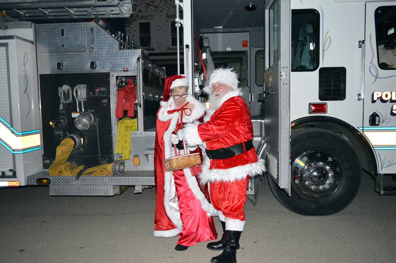 Santa and Mrs. Claus arrive in downtown Polo on one of the city's fire engines, ready to light the community Christmas tree and hear children's wish lists. They visited on Dec. 3, 2022, as part of the fourth annual Polo Christmas Festival.