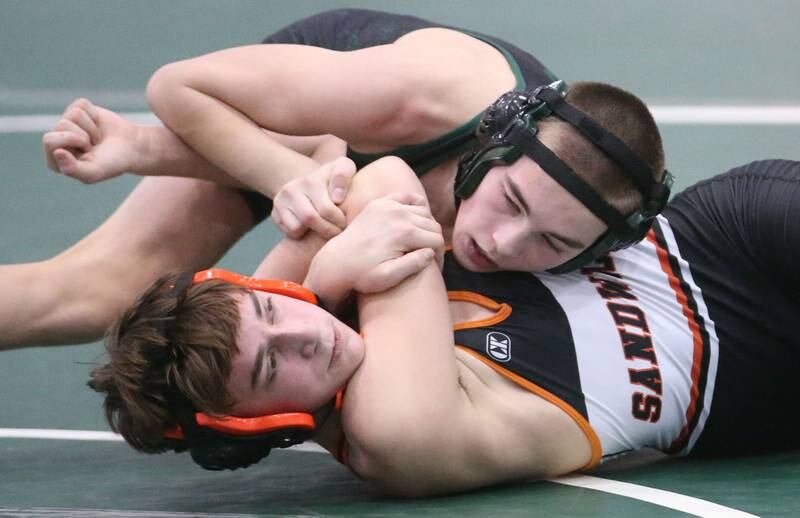 St. Bede's Michael Benge wrestles Sandwich's Dom Urbanski in the 113 pound weight class during the Class 1A Regional meet on Saturday, Feb. 8, 2025 at St. Bede Academy.